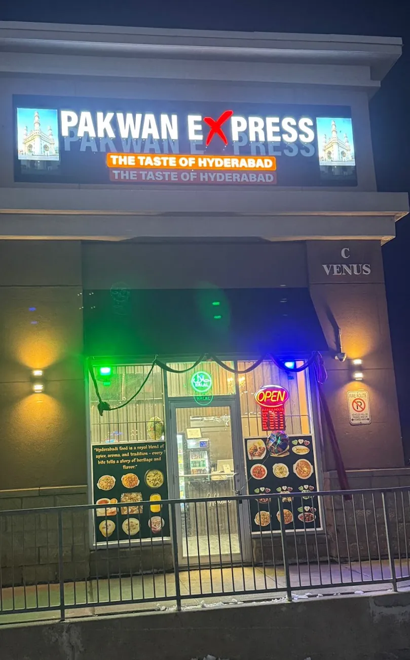 Pakwan Express storefront on Markham Road at night